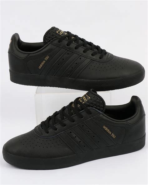 mens black adidas sneakers|black trainers men's size 13.